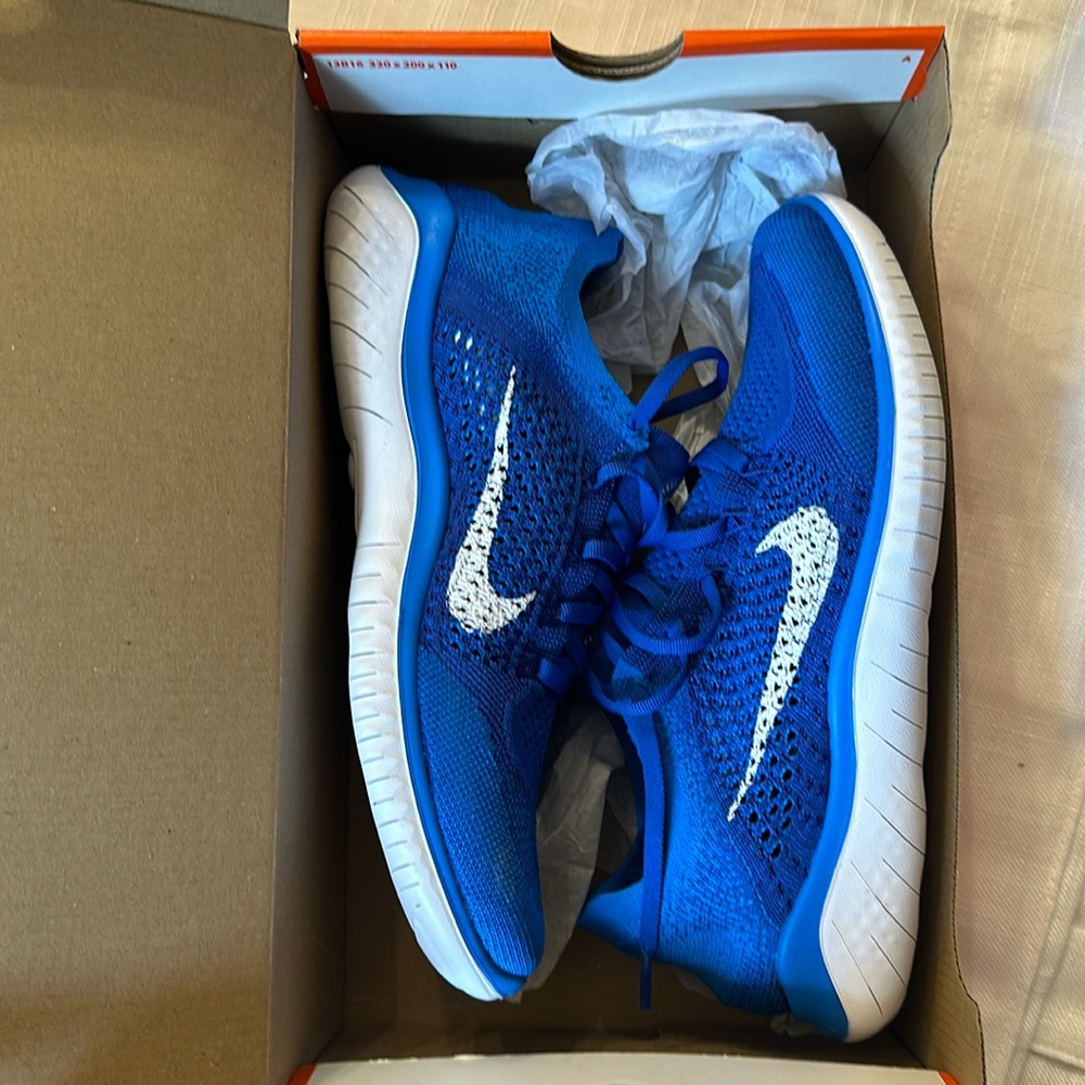 Nike Men’s Blue Running Shoes with White Swoosh